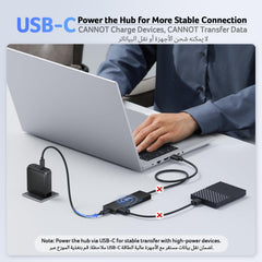 Powered USB splitter for PC connected to laptop with USB-C for stable connection and high-power device support
