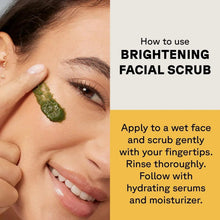 Brightening facial scrub applied: green scrub on cheek, finger spreading product.