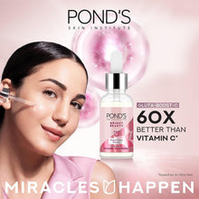 POND'S Bright Beauty serum bottle with '60X better than Vitamin C' label, clear glass
