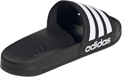 Black adidas pool slippers for men and women with white three stripes and cushioned sole