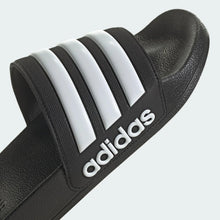 Black adidas slide sandal with three white stripes and large adidas logo on the strap