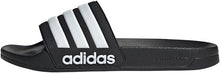 Black Adidas slide sandals with white three-stripe straps and adidas logo