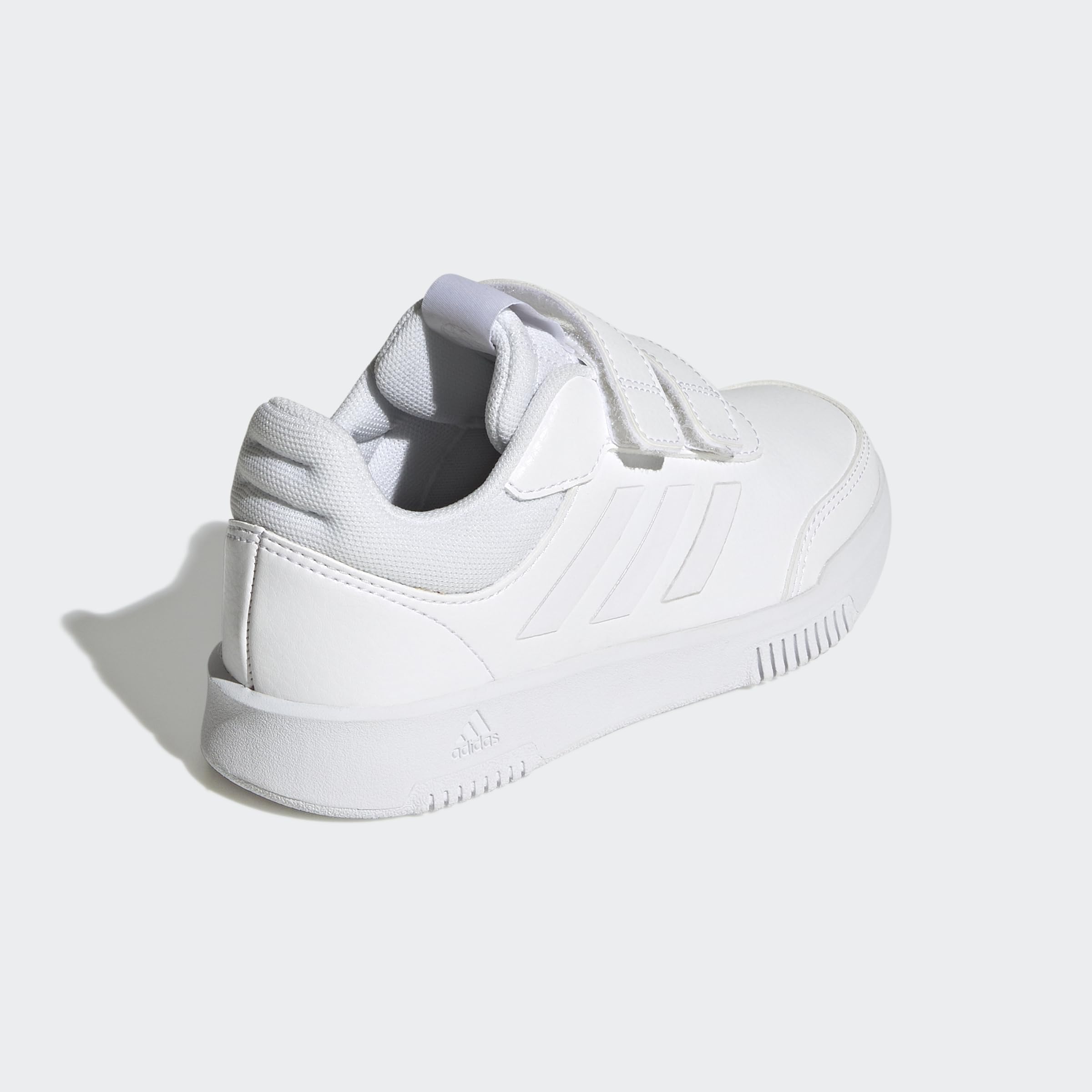 White adidas Tensaur Sport kids shoes with Velcro straps and cushioned sole for comfort
