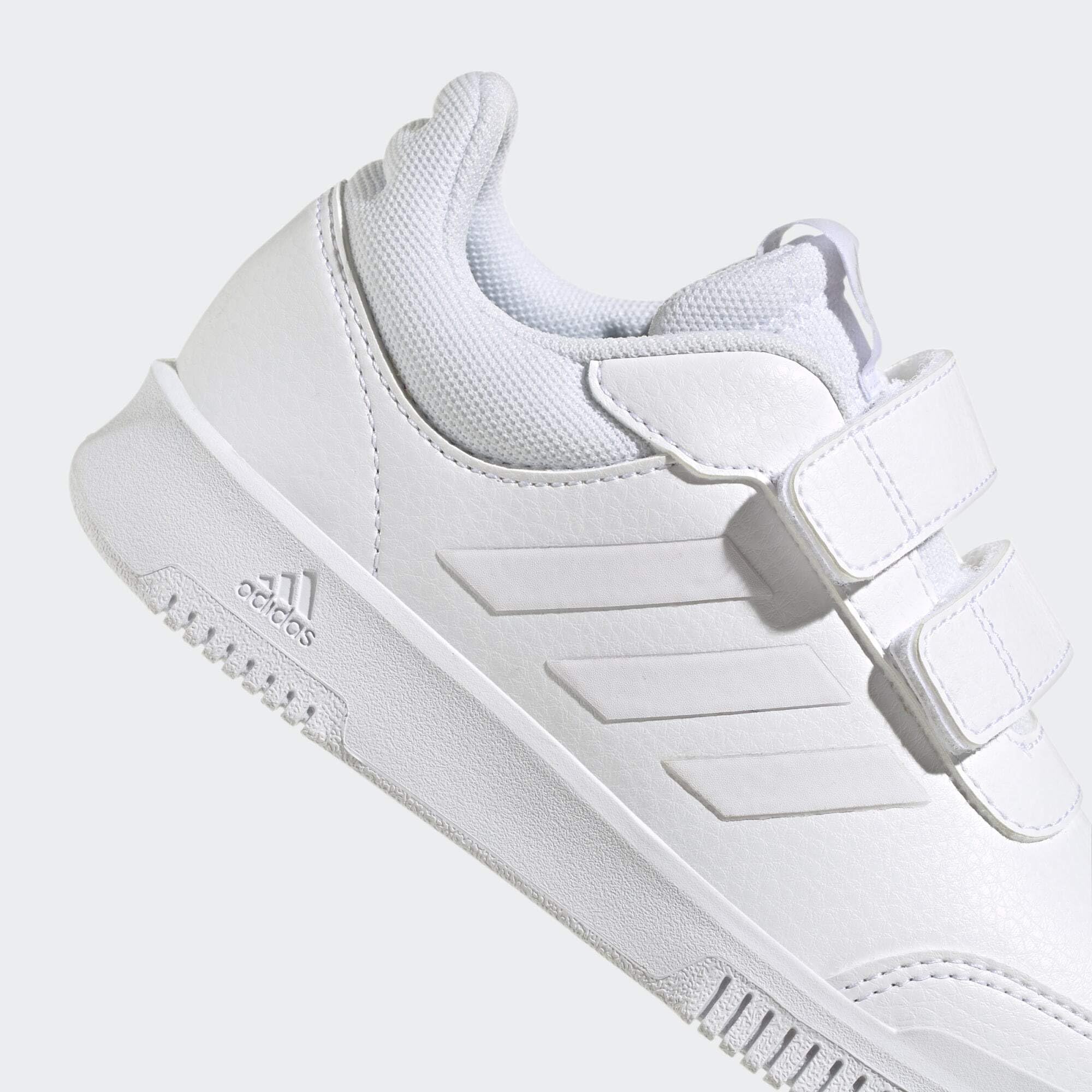 White adidas Tensaur Sport kids shoes with hook and loop straps and textured sole for comfort