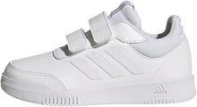 Kids adidas Tensaur sneakers, white upper with three bar stripes and hook-and-loop closure.