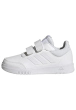 Kids adidas Tensaur sneakers in white with three-bar design and hook-and-loop straps.
