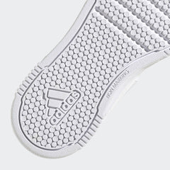 Close-up of white sole with adidas logo on adidas Tensaur Sport kids shoes showing non-marking grip