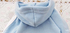 Light blue adidog dog hoodie with a cozy hood and soft fabric for stylish pet wear