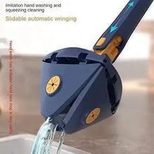 Triangle mop head with wringing-style mechanism and grey microfiber pad