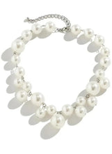 Adjustable pearl necklace with round white pearls and silver-tone chain, full loop