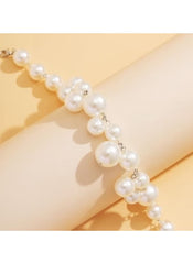 Huitich adjustable pearl necklace 42cm extender with large and small white pearls on beige background