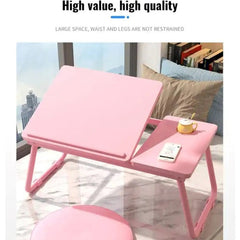 Pink adjustable wooden laptop desk with dual surface for laptop and accessories in a cozy room