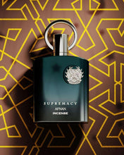 Afnan Supremacy Incense eau de parfum bottle, dark teal blue with chrome top