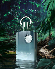 Unisex luxury eau de parfum 100ml bottle with silver cap and embossed emblem in a forest setting