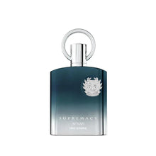 Unisex eau de parfum bottle, teal gradient with silver cap ring and crest emblem.