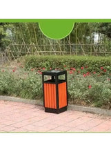 Outdoor dustbin with black sides and red vertical panels, rectangular litter opening.
