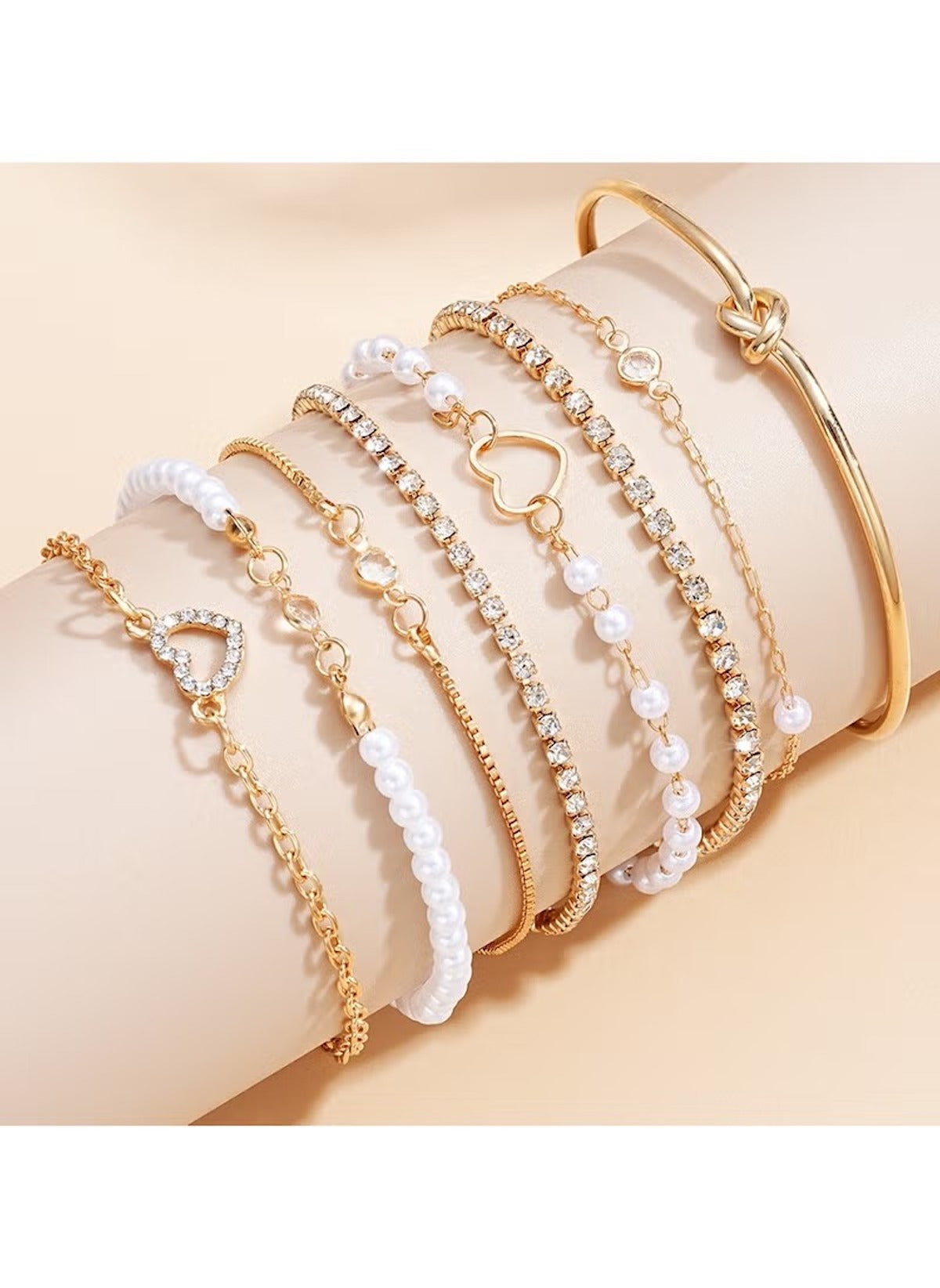 Huitich 8 piece alloy bracelet set featuring gold tones, pearls, rhinestones, and heart designs