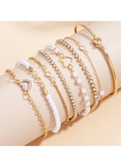 Huitich 8 piece alloy bracelet set featuring gold tones, pearls, rhinestones, and heart designs