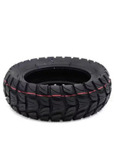 All-terrain scooter tire with black tread and red side markings