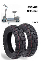 Pair of 10-inch all-terrain inflatable tires, black tread with red sidewall lines