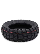 All-terrain inflatable tire, black with thick tread and red accent side lines