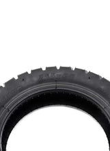 All-terrain inflatable tire tread, black with raised blocks and side lettering
