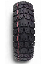 All-terrain inflatable tire, black tread with red sidewall guide lines