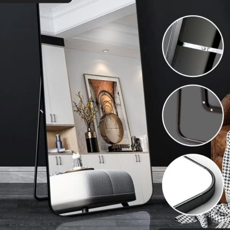 Huitich floor mirror with aluminum alloy frame mirror and sleek modern design standing in a stylish living room