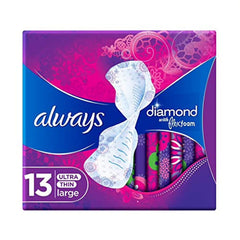 Always Diamond Flexfoam sanitary pads. Pack of 13 ultra thin large pads in purple floral box showing individual pads