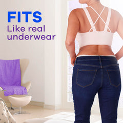 Back view of woman in jeans and white bra showing disposable postpartum underwear for women that fits like real underwear
