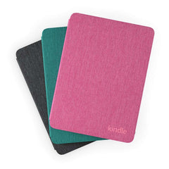 Three colorful Kindle covers made of waterproof Kindle cover fabric in pink teal and black