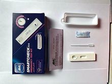 AME SmartCheck HCG pregnancy test kit tray with blue box, cassette holder, and strip
