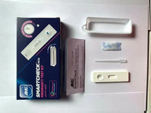 AME SmartCheck HCG pregnancy test kit components in tray: blue box, cassette, strip