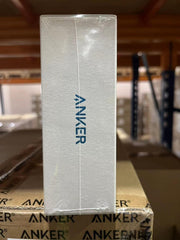 Anker branded packaging box for 2K webcam for laptop displayed on stacked Anker boxes