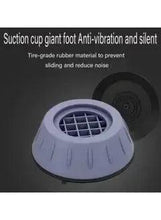 Round gray anti-vibration pad with vented top and textured underside