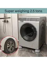 Washing machine base on gray anti-vibration pads, sturdy wide feet