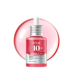 Anua Niacinamide 10 TXA 4 serum bottle with pink liquid drop backdrop tranexamic acid serum fragrance free