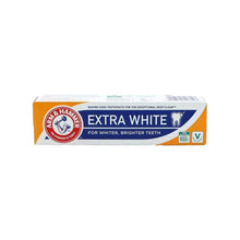 Toothpaste box with Arm & Hammer logo, Extra White whitening formula
