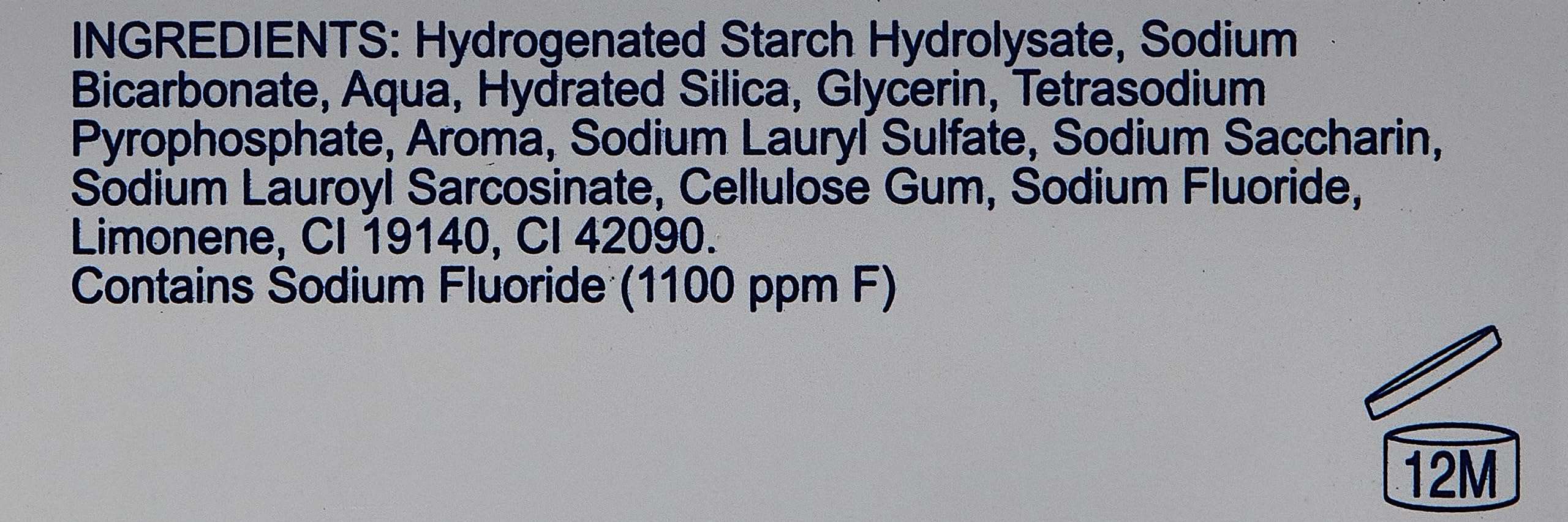 Close up ingredients label for Arm & Hammer Advance White toothpaste listing sodium fluoride and 12M icon