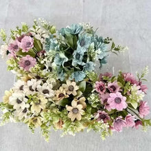 Artificial flower bonsai decor with blue, pink, and white flowers in white pot