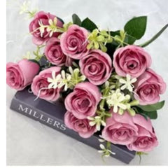 Huitich artificial flower arrangement dark pink roses with green leaves and white accents on a book