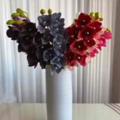 Huitich artificial flowers for wedding decoration online in black blue and red colors arranged in white vase