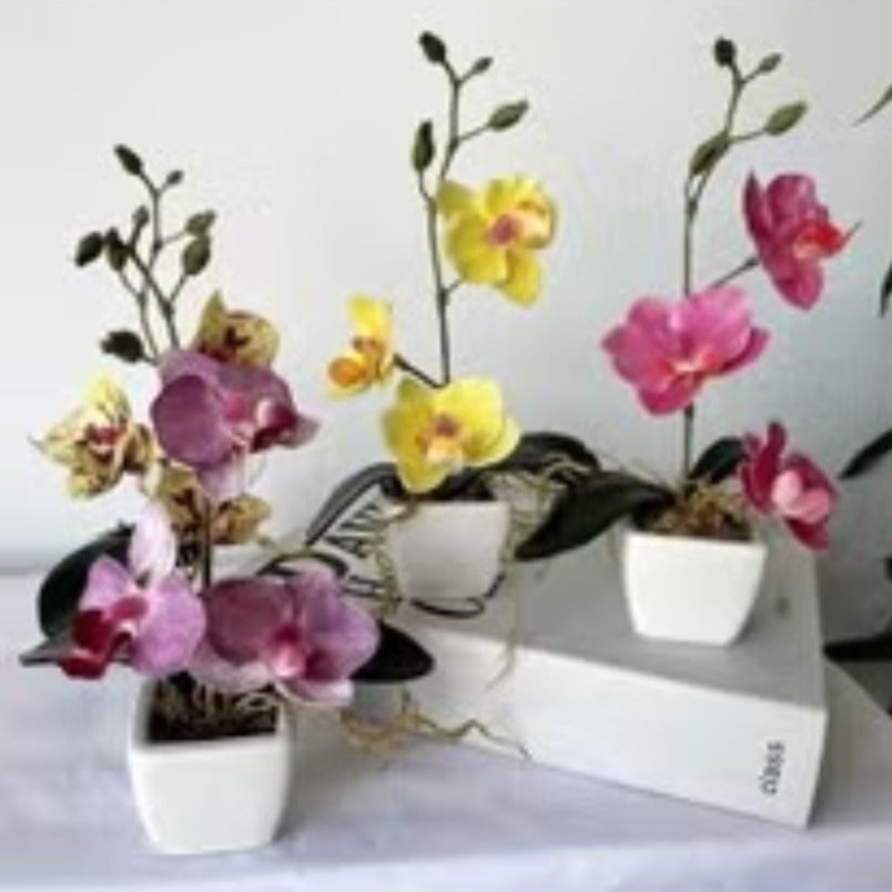 Huitich white artificial flowers in pot with pink and yellow orchids decorative set