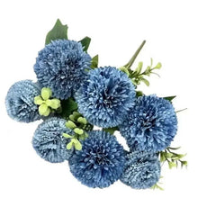 Artificial fluffy rose bouquet with blue pom-pom flowers and green leaves