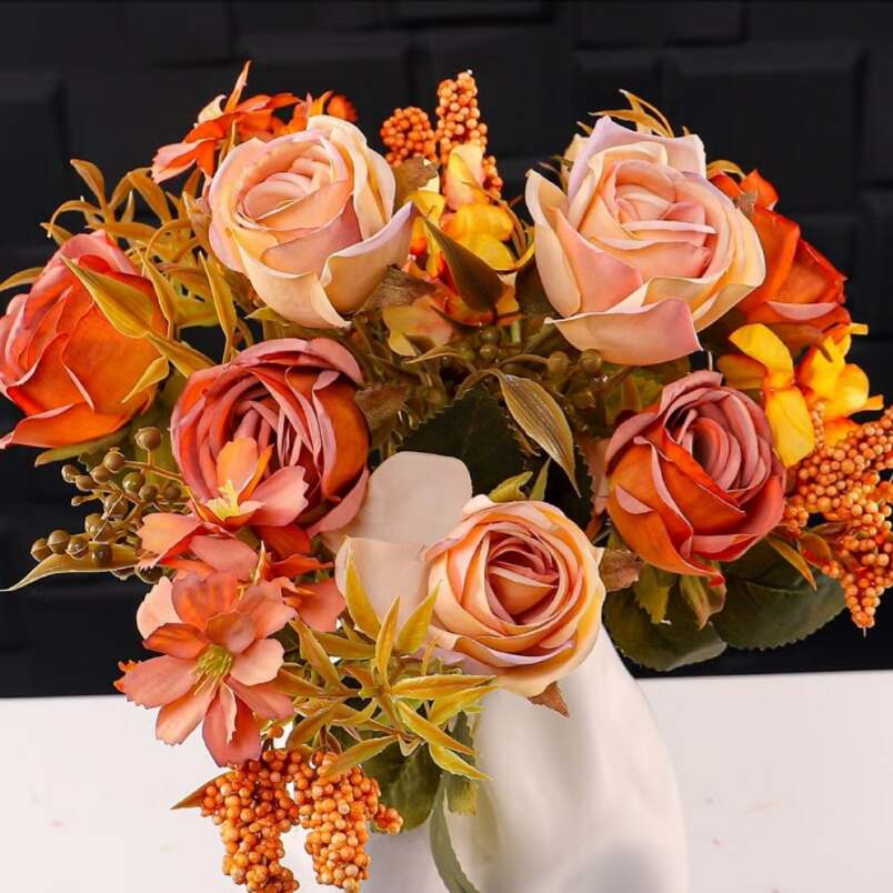 Huitich artificial mini rose flower bunch in warm tones with green leaves and orange accents