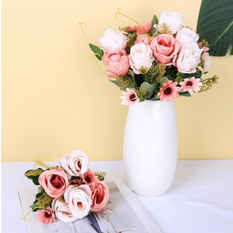 Huitich artificial mini rose flowers bouquet with pink and white blooms in a white vase and lying on a table