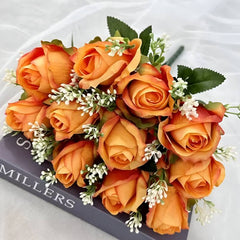 Huitich artificial orange roses for wedding bouquet with white accents and green leaves