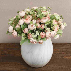 Huitich artificial peony bouquet in a white vase with light pink flowers and green leaves decor