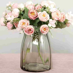 Huitich artificial peony bouquet with soft pink flowers arranged in a clear glass vase for home decor