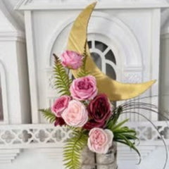 Huitich artificial red Austin flowers arranged with pink and maroon roses and green foliage in decorative setting